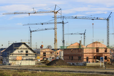 Construction site on field against sky