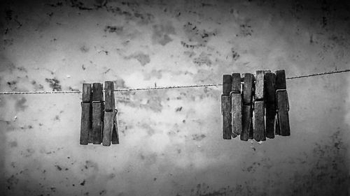 Clothes hanging on clothesline against sky