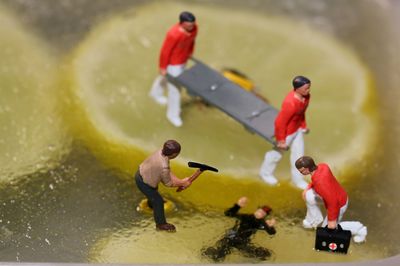 Close-up of figurines on ice