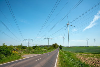 Highway, power transmission lines and wind energy plants seen in germany