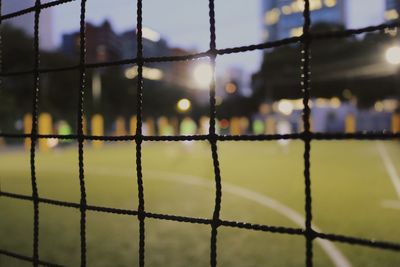 Full frame shot of net at dusk