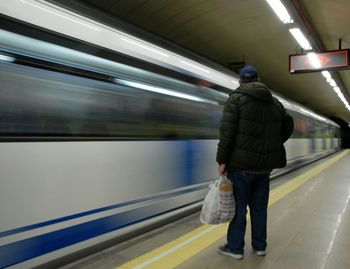 Rear view of train on railroad station platform