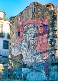 Low angle view of graffiti on building wall