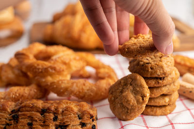 Close-up of hand holding cookies