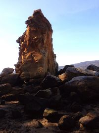 Stone wall against clear sky