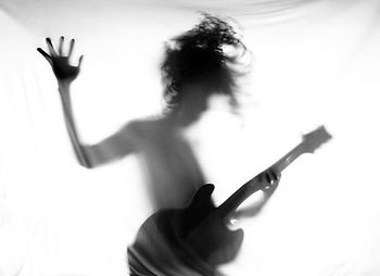 Close-up of woman holding white background