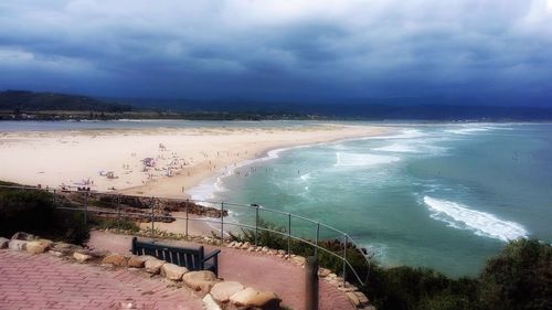 Scenic view of sea against cloudy sky