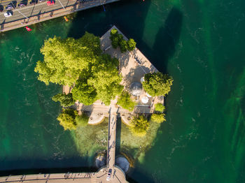 High angle view of built structure by lake