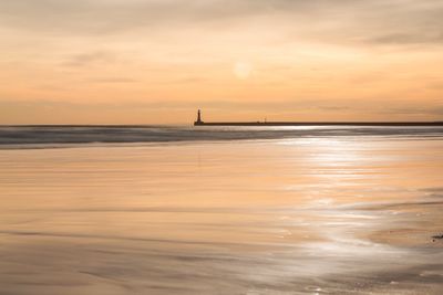 Scenic view of sea during sunset