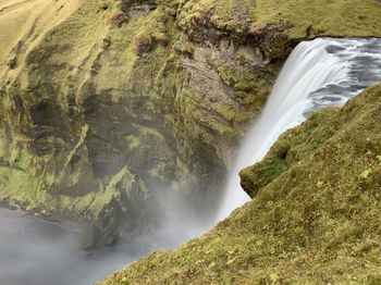 Scenic view of waterfall in iceland