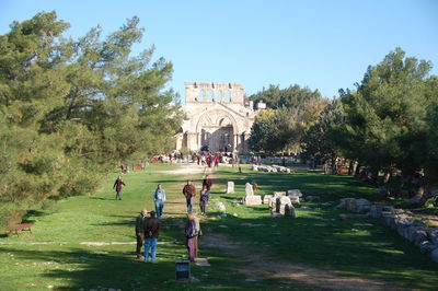 Group of people in front of historical building