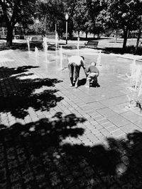 People on footpath in park