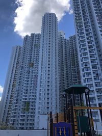 Low angle view of modern buildings against sky