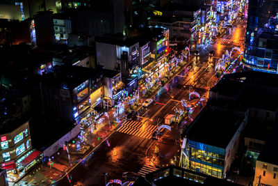 High angle view of illuminated city at night