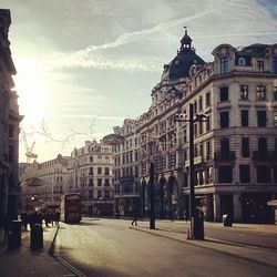 Buildings in city against sky