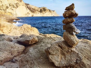 Scenic view of sea against blue sky