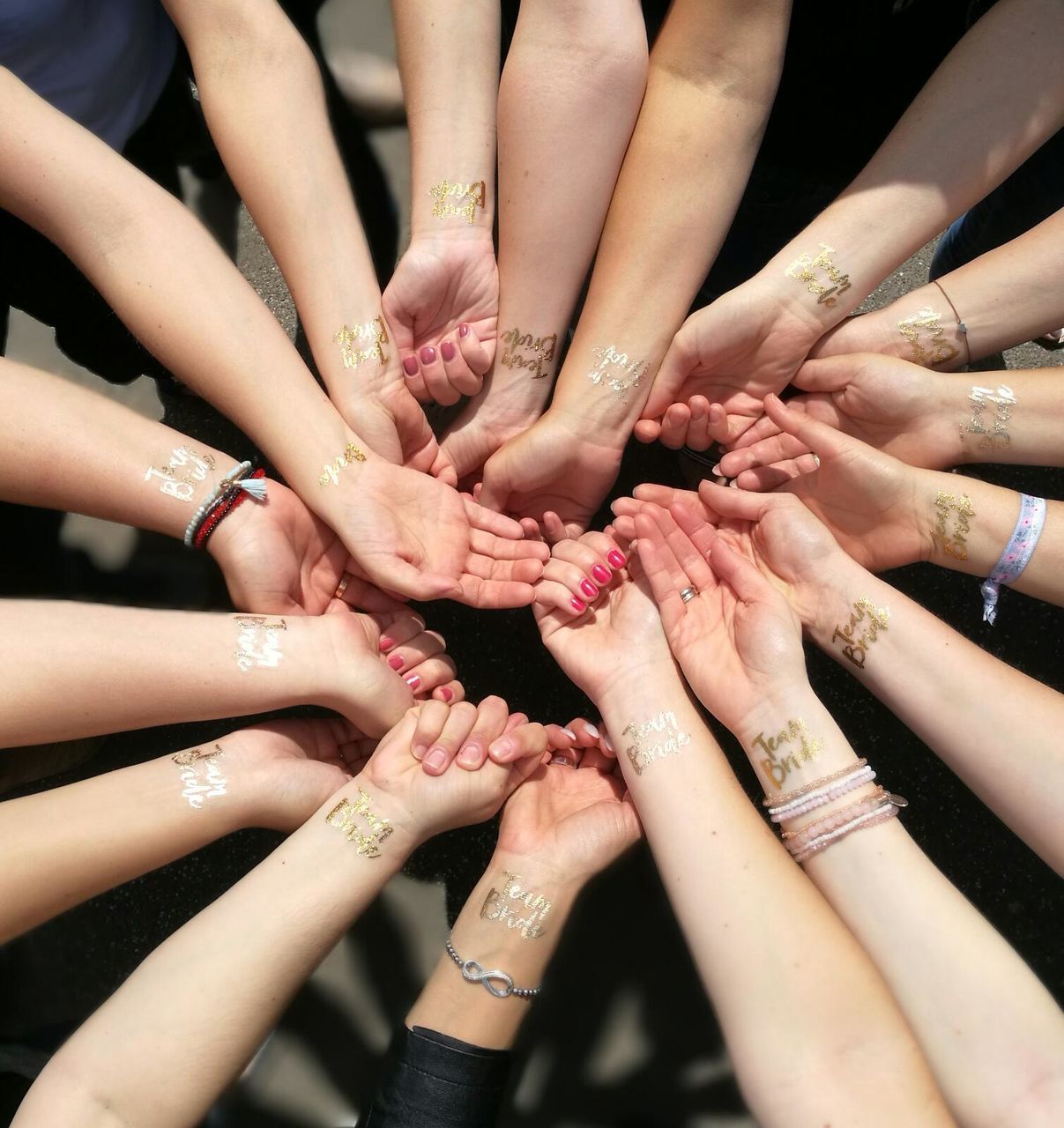 human hand, hand, group of people, human body part, real people, togetherness, unity, cooperation, human finger, large group of people, group, teamwork, finger, body part, women, crowd, connection, high angle view, human limb