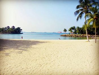 Scenic view of beach against sky