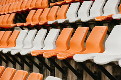 Full frame shot of empty chairs in stadium