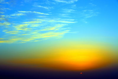 Low angle view of dramatic sky during sunset