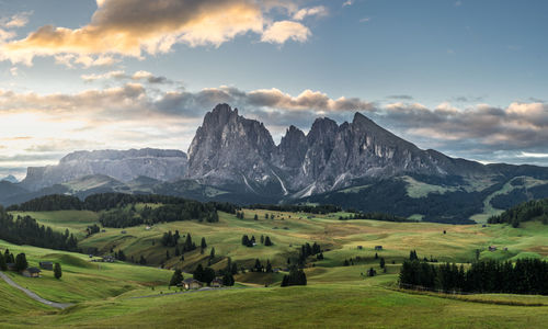 Scenic view of landscape and mountains against sky