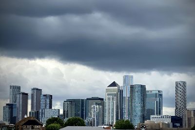 Buildings in city against sky