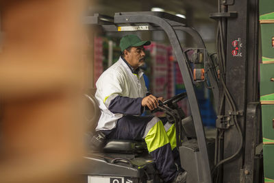 Worker in forklift