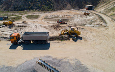 Gravel quarrying in a gravel pit during a drone flight