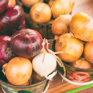 Close-up of onions in market for sale