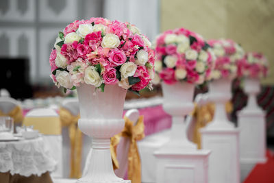 Close-up of flower vase against blurred background