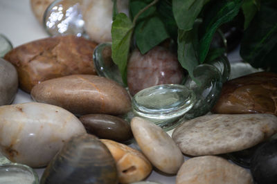 Close-up of pebbles on table