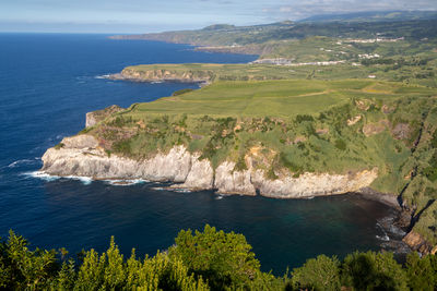 View of rocky coastline - sao miguel island, azores, seen from the miradouro de santa iria viewpoint