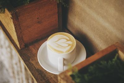 High angle view of cappuccino on table