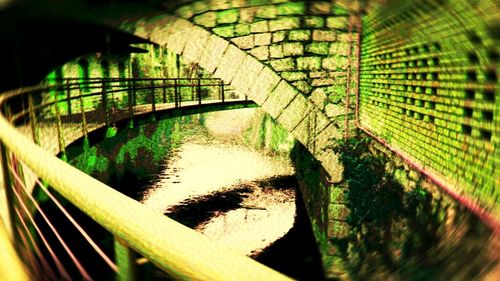 Bridge reflecting in water