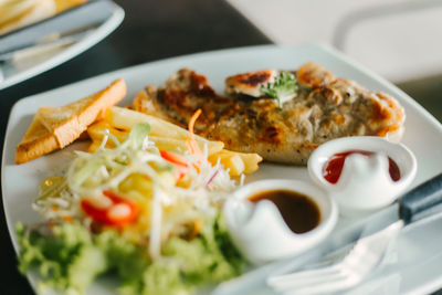 Close-up of food in plate on table