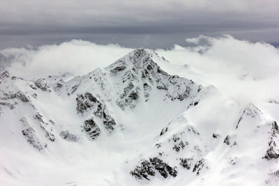 Aerial view of snow covered landscape