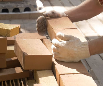 Close-up of man working on wood