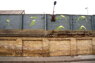 Graffiti on wall against building