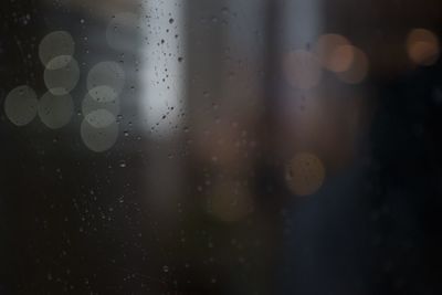 Close-up of raindrops on glass window