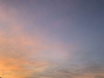 Low angle view of clouds in sky during sunset