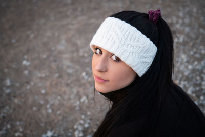 Portrait of woman wearing hat