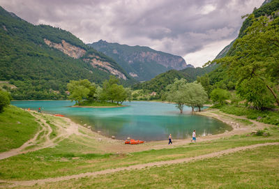 Panoramic view of lake and mountains against sky