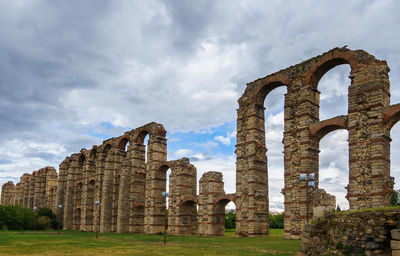 Old ruin building against cloudy sky