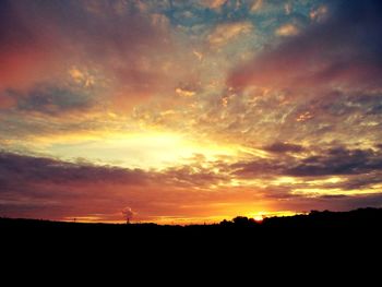 Scenic view of dramatic sky during sunset