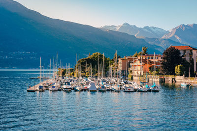 Scenic view of sea and mountains against sky