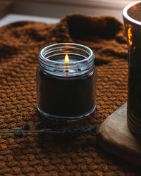 High angle view of tea light candles on table