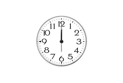 Close-up of clock on wall