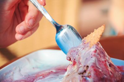 Close-up of person preparing food