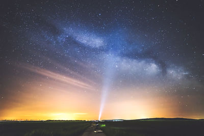 Scenic view of star field against sky at night