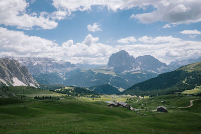 Scenic view of landscape and mountains against sky